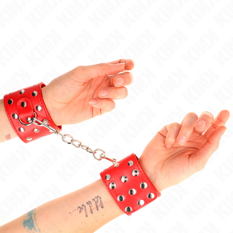 Kink – Handgelenkfesseln mit Druckverschluss Voller Nieten Rot Vers...